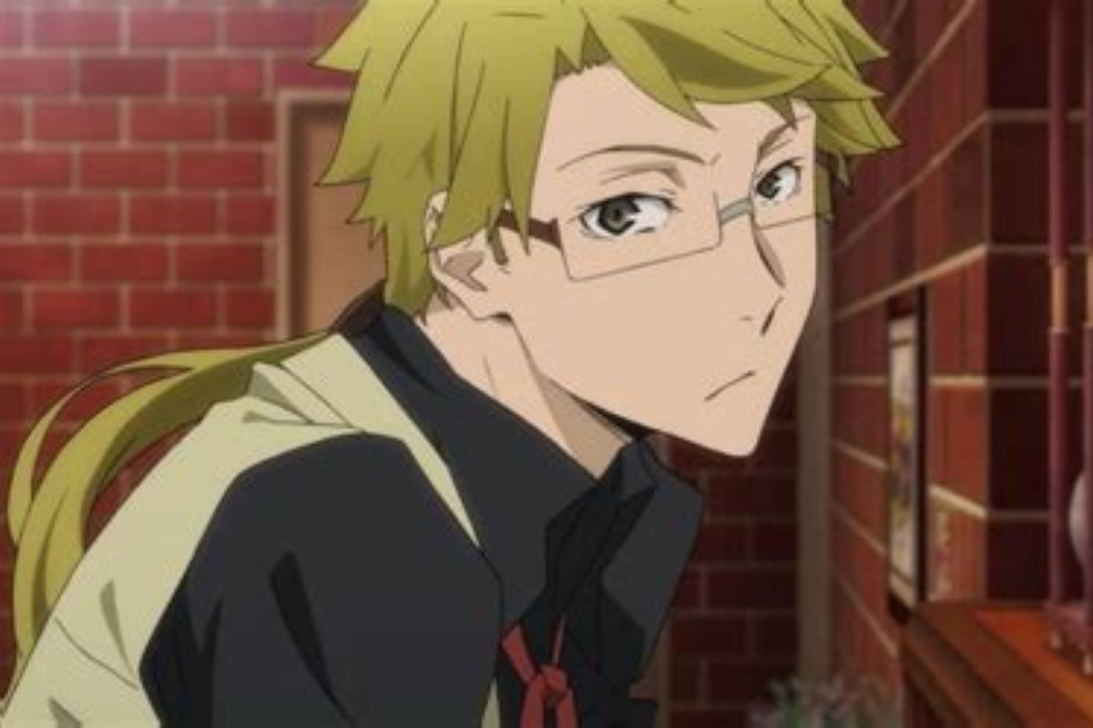 Kunikida Doppa from Bungo from Bungo Stray Dogs, a blond man with a ponytail and glasses, looking at the camera displeased.