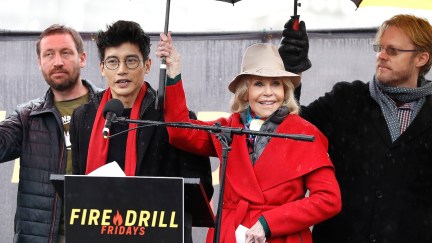 Manny Jacinto and Jane Fonda standing on a stage together