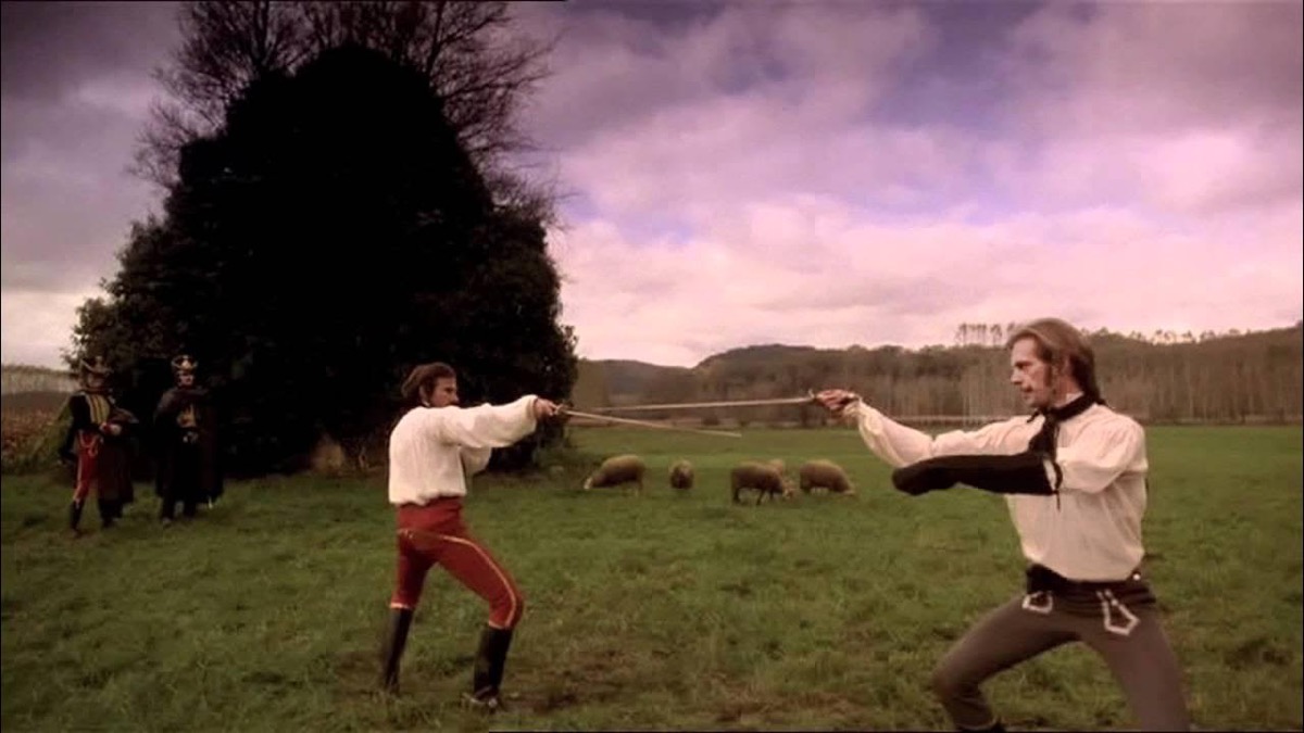 Two men face each other in a field with swords drawn in "The Duellists" 