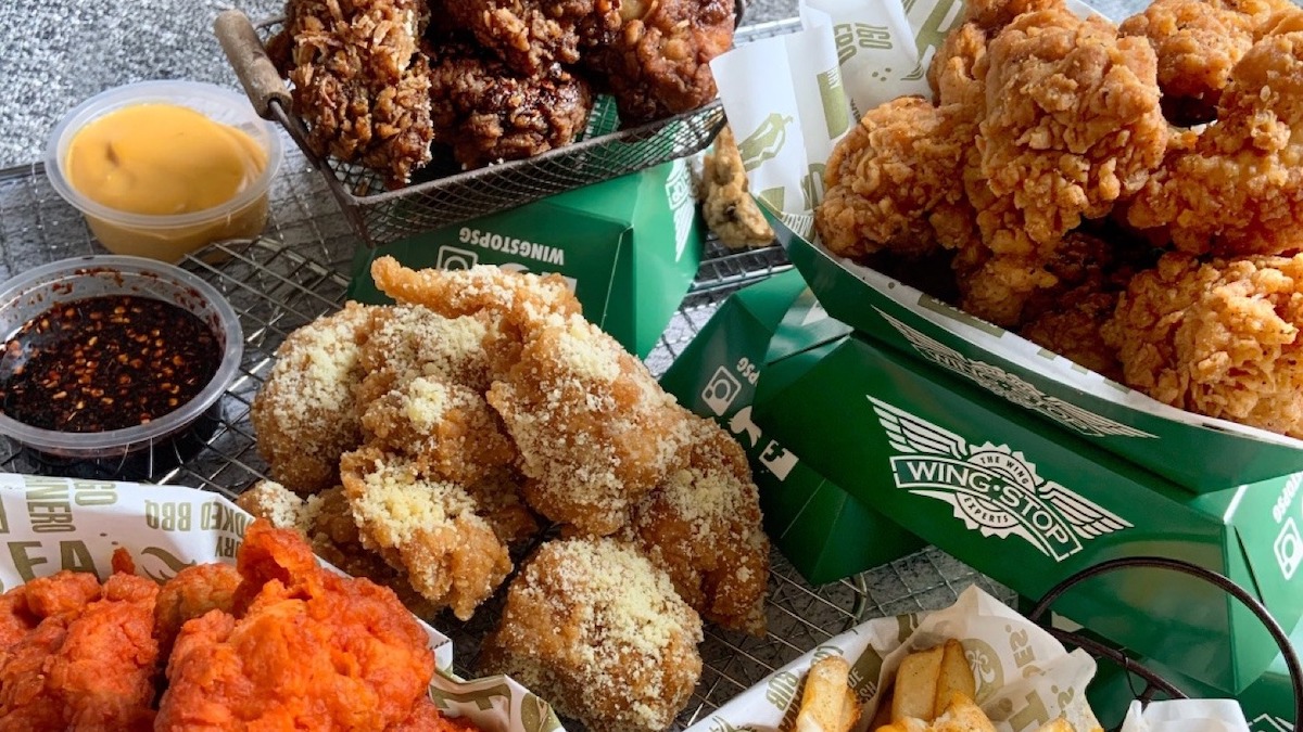 Baskets of different flavored Wingstop wings