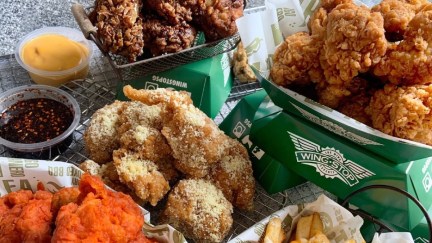 Baskets of different flavored Wingstop wings