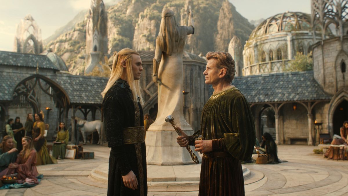 Charlie Vickers as Annatar and Charles Edwards as Celebrimbor stand facing each other in Eregion in Rings of Power season 2