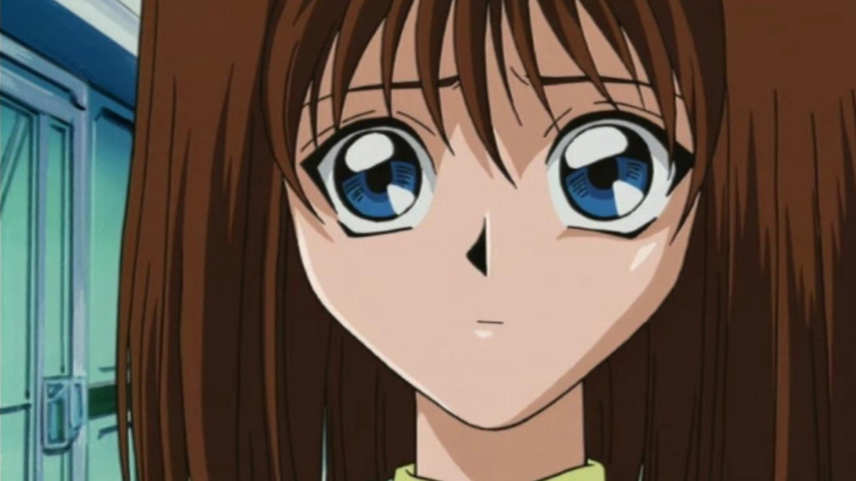 A young woman looks fearful in "Yu Gi Oh!"