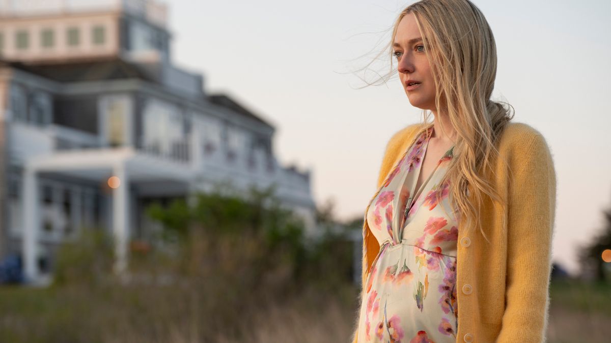 Dakota Fanning as Abby Winbury stares at the ocean in The Perfect Couple