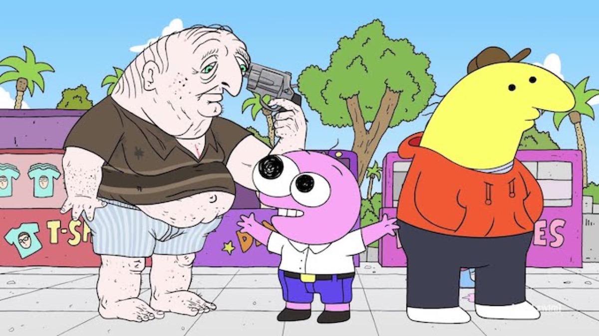 Two critters hang with a man holding a gun to his head in "Smiling Friends" 