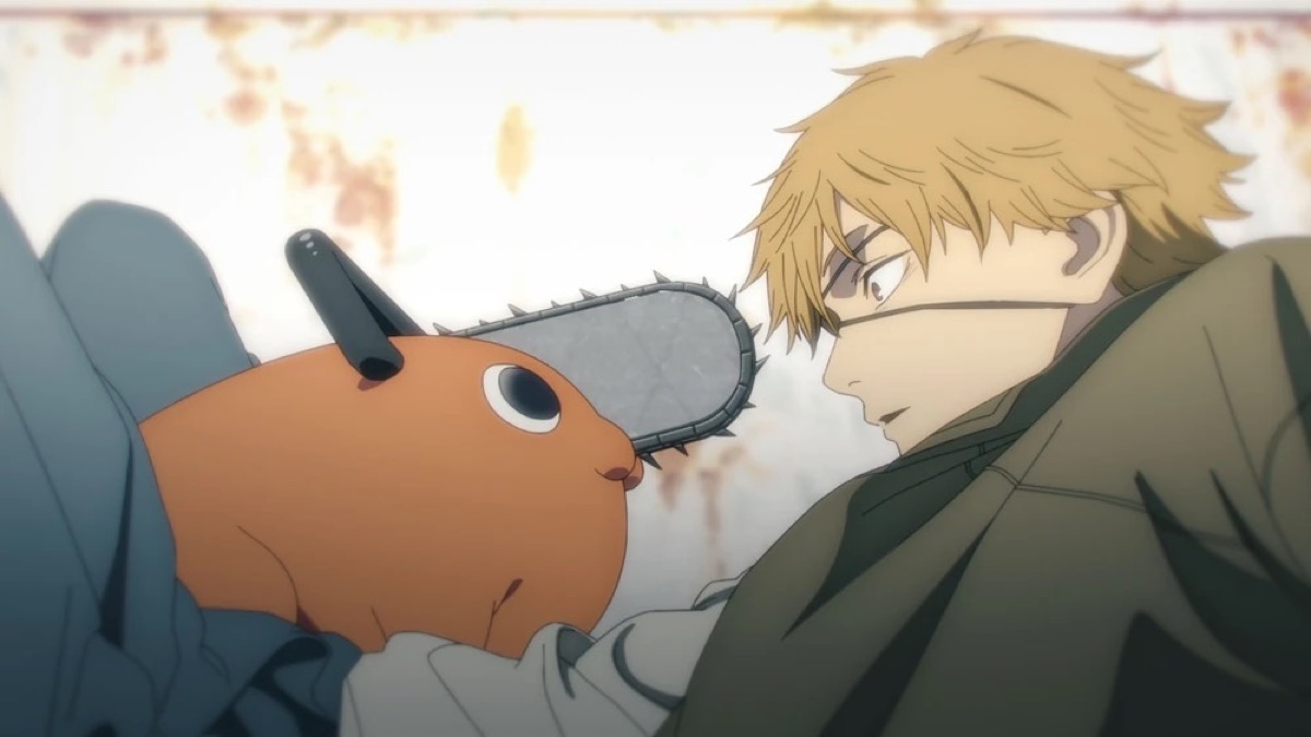 A young man looks at a dog with a chainsaw nose in "Chainsaw Man"