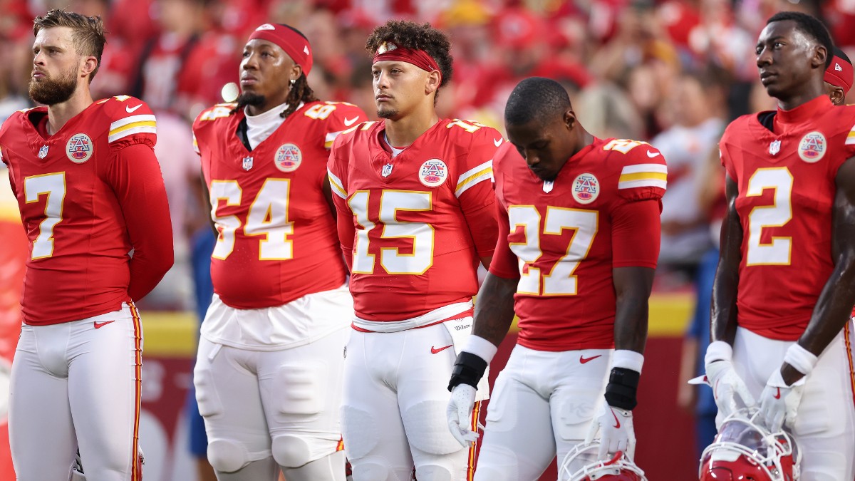 Members of the Kansas City Chiefs standing for the National Anthem