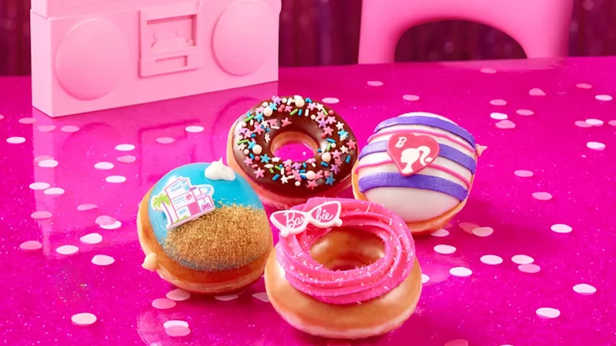 Barbie donuts all laid out on a table