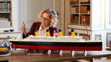 A woman works on a LEGO Titanic