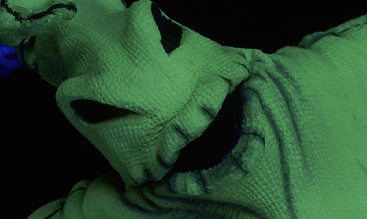 Oogie Boogie the sack monster glows green in "A Nightmare Before Christmas"