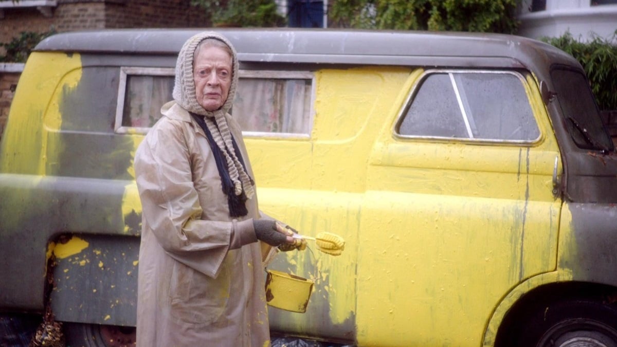 Maggie Smith paints a van yellow