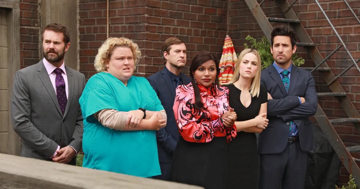 The Mindy Project, the staff of the clinic stand shivering in the cold on their balcony