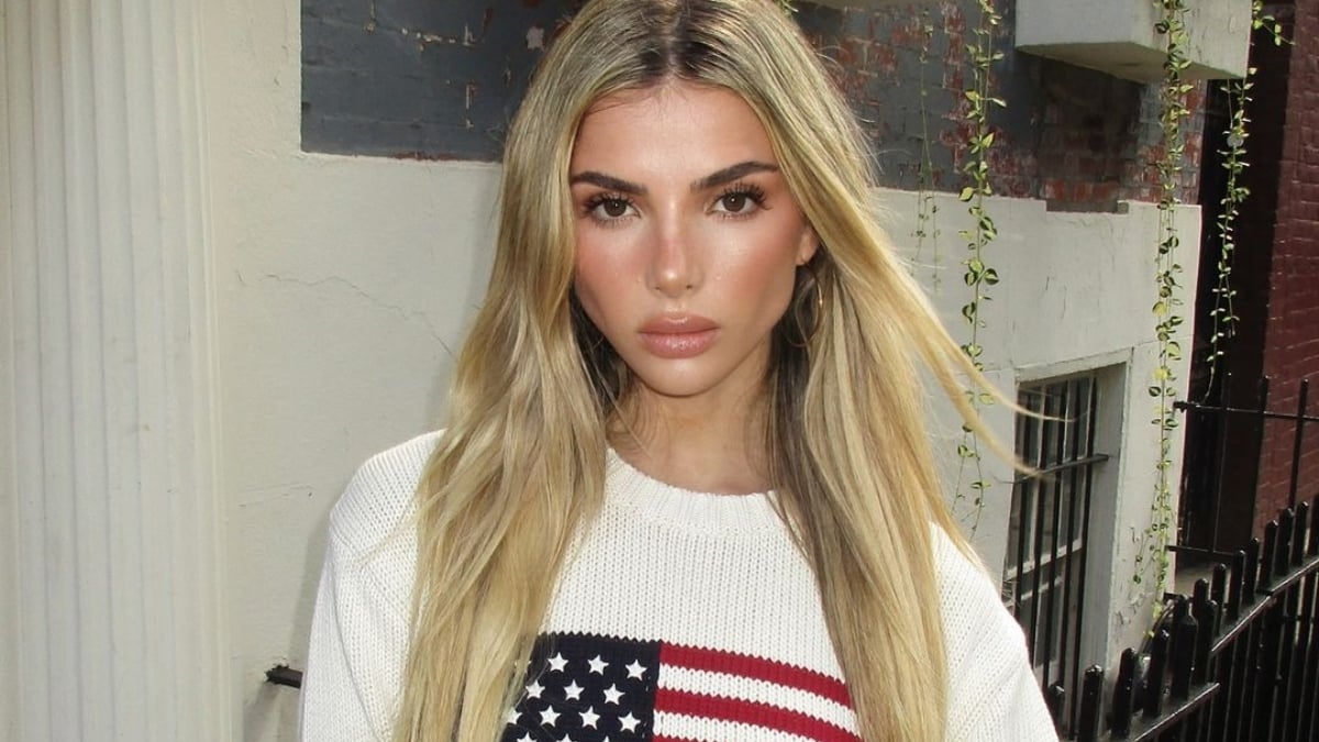 Influencer Liv Schmidt wearing a white shirt with an American flag