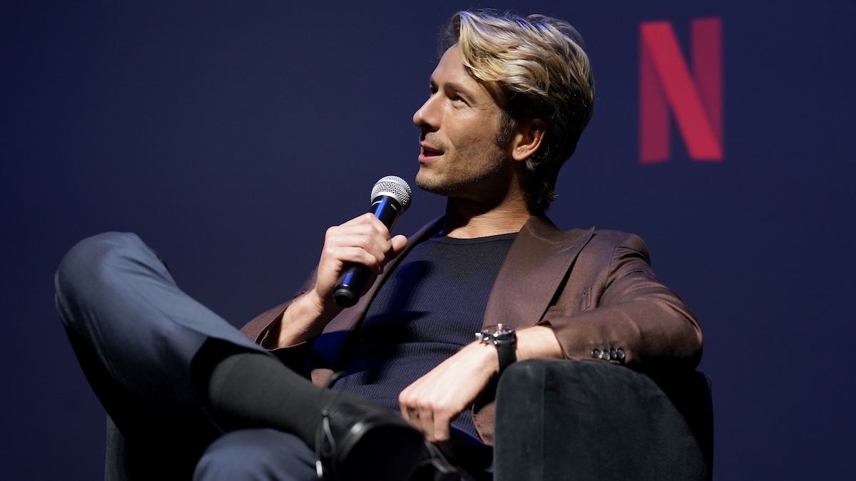 glen powell sitting