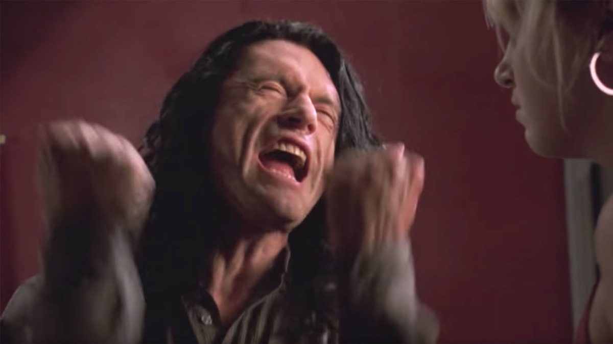 A man freaks out and shakes his fists in "The Room"