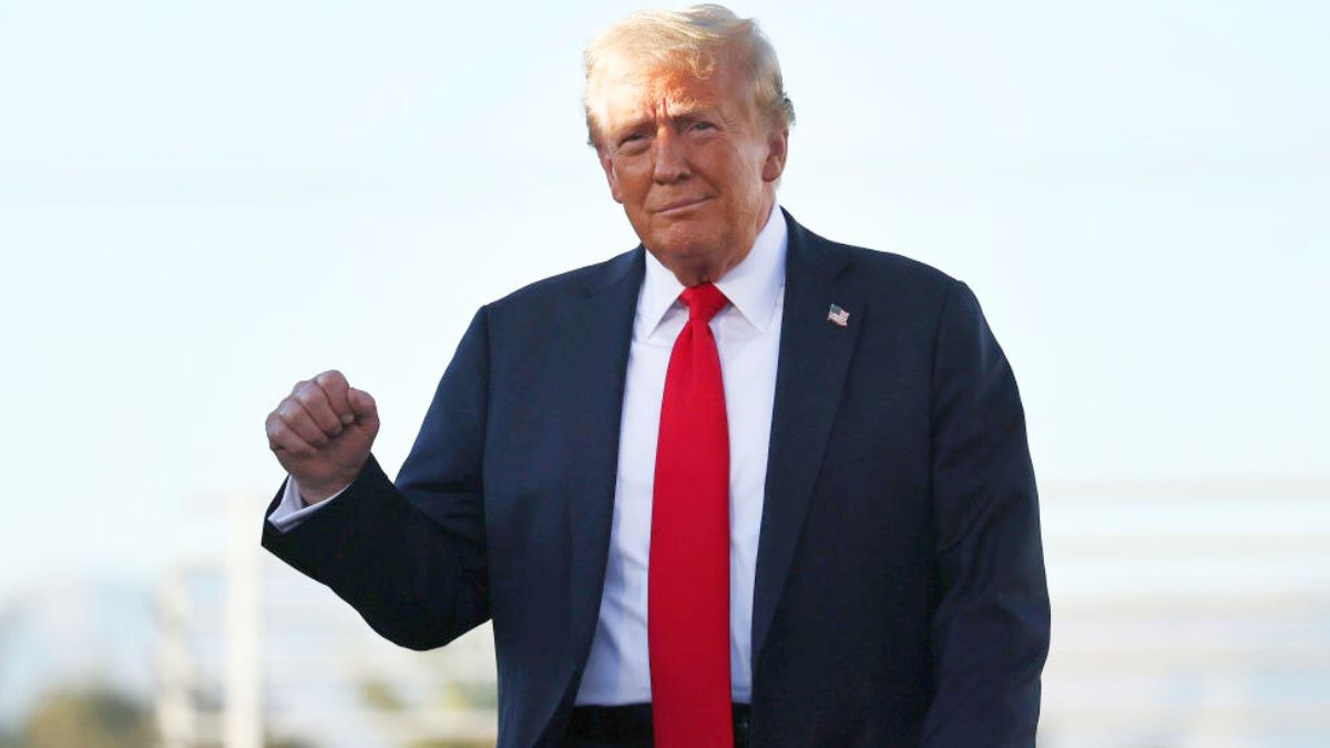 COACHELLA, CALIFORNIA - OCTOBER 12: Republican presidential nominee, former U.S. President Donald Trump gestures as he walks onstage for a campaign rally on October 12, 2024 in Coachella, California. With 24 days to go until election day, former President Donald Trump is detouring from swing states to hold the rally in Democratic presidential nominee, Vice President Kamala Harris' home state. (Photo by Mario Tama/Getty Images)