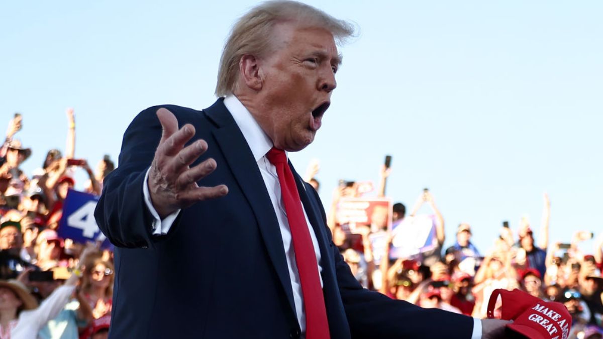 COACHELLA, CALIFORNIA - OCTOBER 12: Republican presidential nominee, former U.S. President Donald Trump gestures as he walks onstage for a campaign rally on October 12, 2024 in Coachella, California. With 24 days to go until election day, former President Donald Trump is detouring from swing states to hold the rally in Democratic presidential nominee, Vice President Kamala Harris' home state. (Photo by Mario Tama/Getty Images)