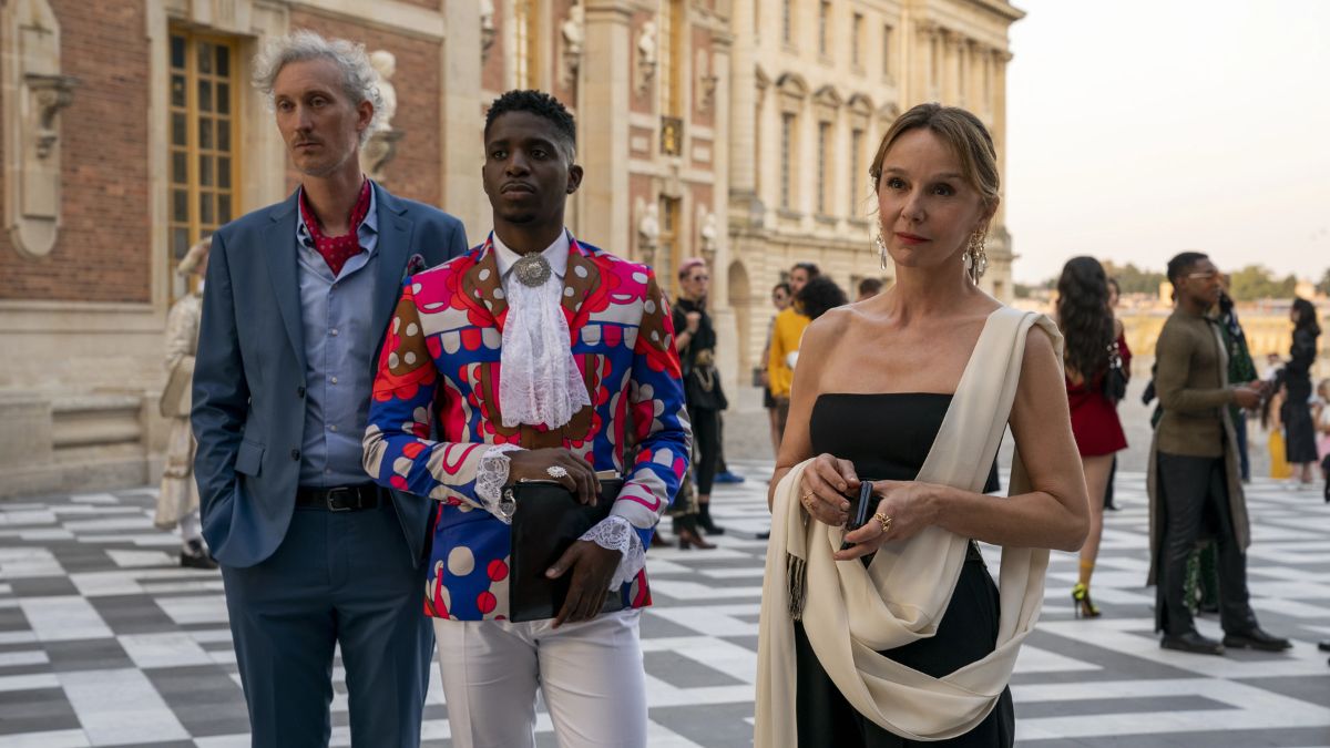 Bruno Gouery, Samuel Arnold, and Philippine Leroy-Beaulieu as Luc, Julien, and Sylvie in Emily In Paris