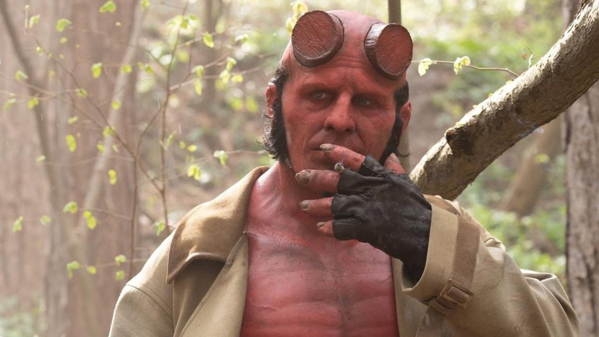 Jack Kesy as Hellboy smoking a cigarette in 'Hellboy: The Crooked Man' 