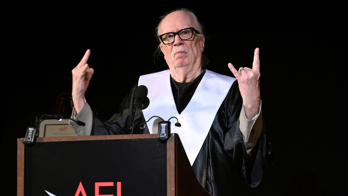 HOLLYWOOD, CALIFORNIA - AUGUST 10: John Carpenter speaks onstage during the AFI Commencement - Class of 2024 at TCL Chinese Theatre on August 10, 2024 in Hollywood, California. (Photo by Michael Kovac/Getty Images for AFI)