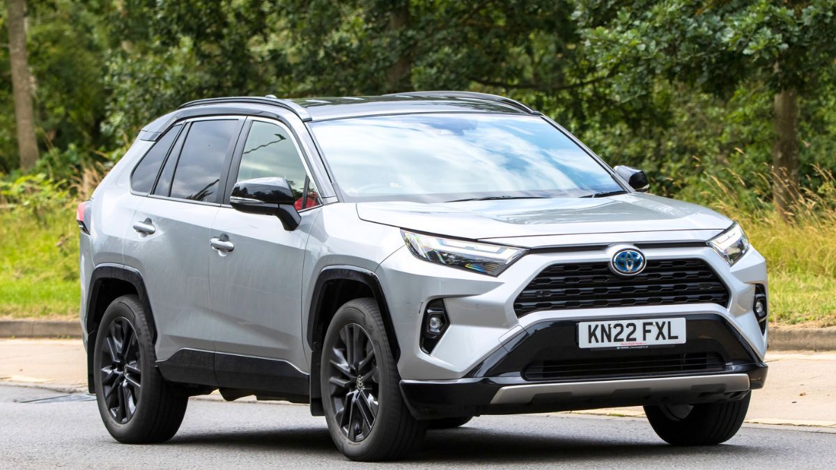 Milton Keynes,UK - July 13th 2023: 2022 silver hybrid electric TOYOTA RAV4 car driving on an English road