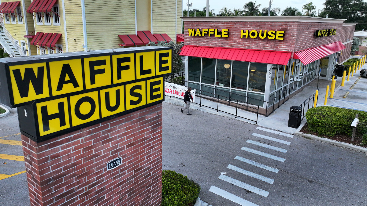 MIAMI GARDENS, FLORIDA - JULY 30: In an aerial view, a Waffle House restaurant on July 30, 2024 in Miami Gardens, Florida. The restaurant chain created in the state of Georgia in 1955 now has over 1,900 locations in 25 states in the United States. (Photo by Joe Raedle/Getty Images)