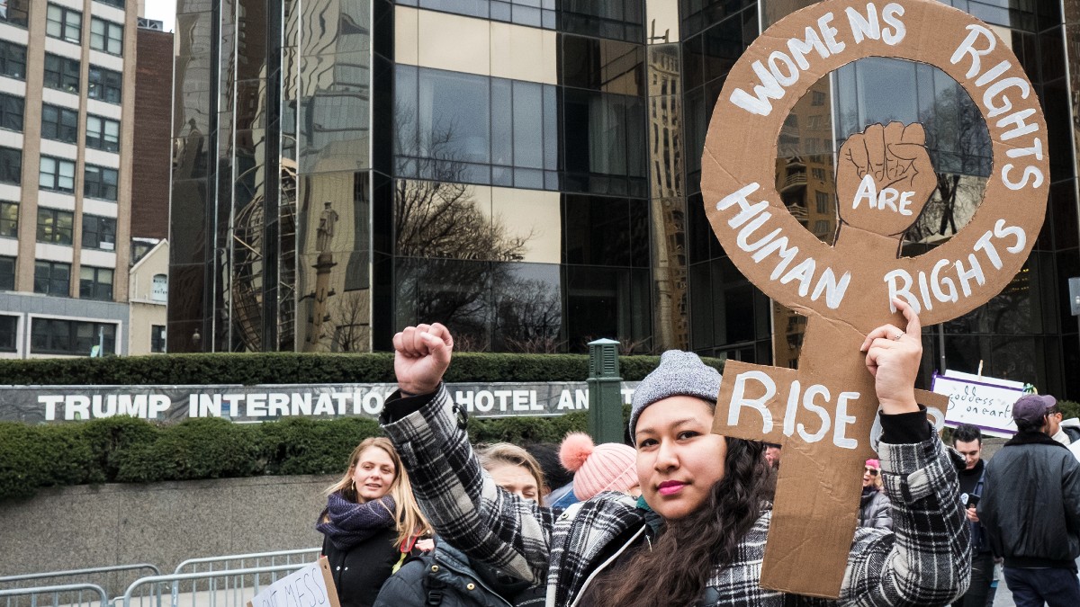 Women rally for equal rights during the Women's March outside of Trump International Tower