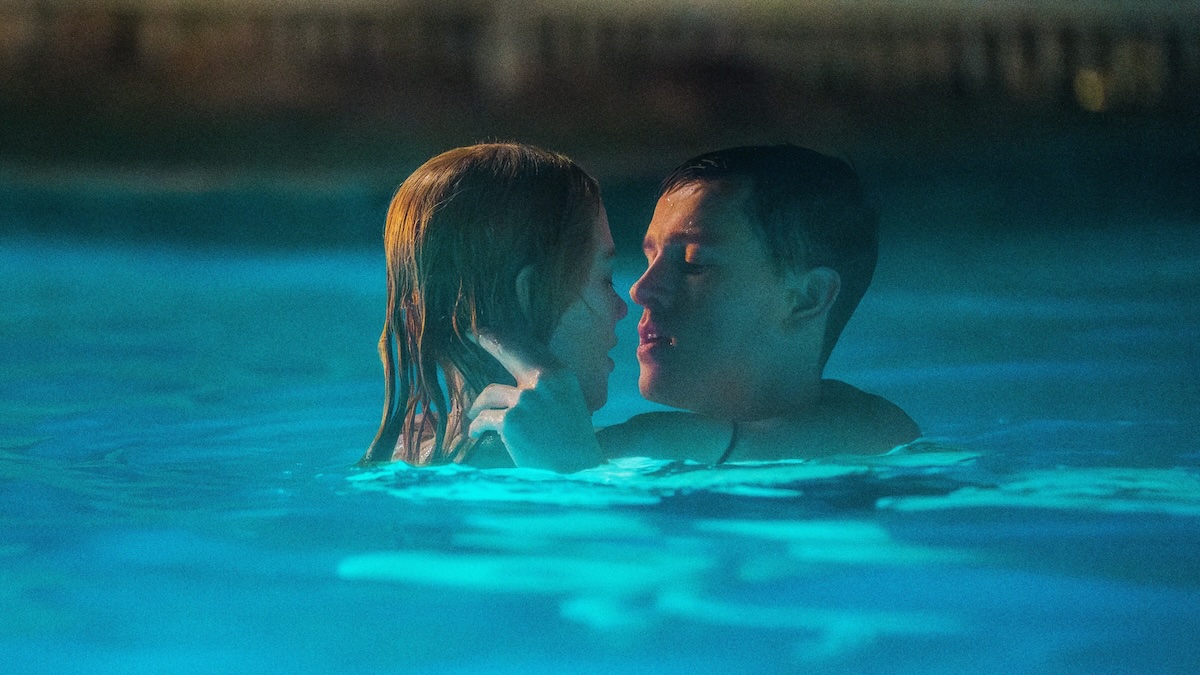 harris dickinson and nicole kidman swimming in a pool together