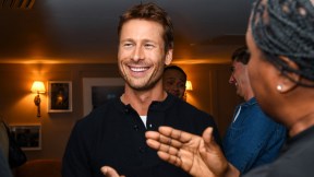 glen powell at an event