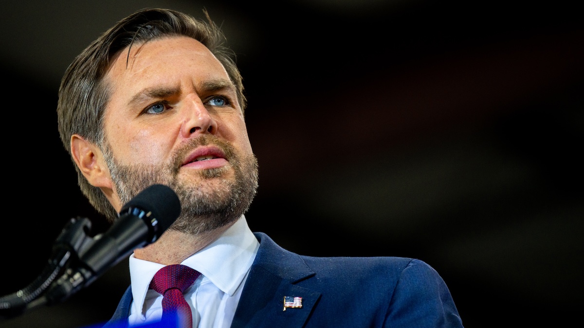 jd vance at a stand at a rally