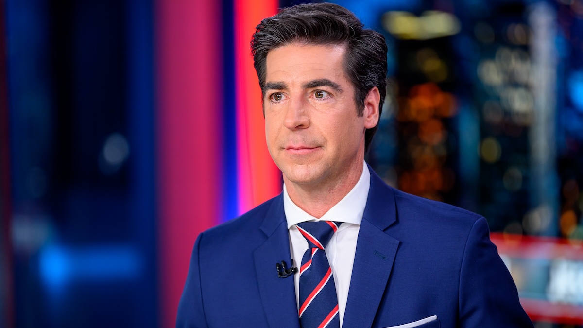 jesse watters at a desk