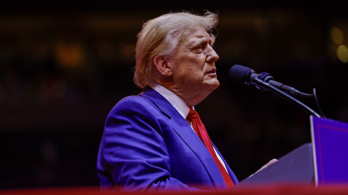 donald trump standing at a podium