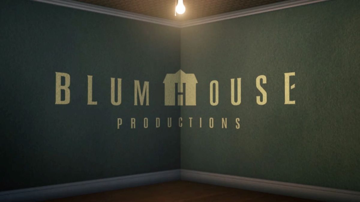 Blumhouse Productions logo. The name of the company in pale yellow letters across the corner of a room on green wallpaper with a bare lit bulb hanging from the ceiling.