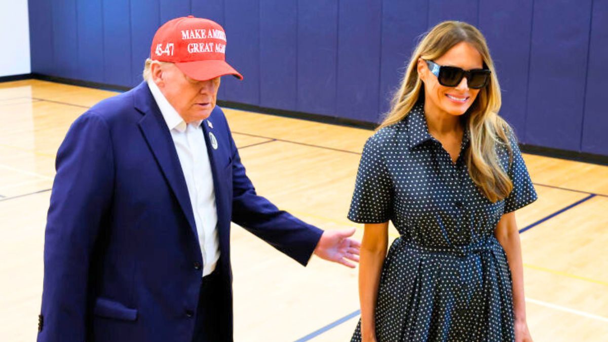 PALM BEACH, FLORIDA - NOVEMBER 05: Republican presidential nominee former President Donald Trump escorts his wife Melania Trump at the polling place in the Morton and Barbara Mandel Recreation Center on Election Day, on November 05, 2024 in Palm Beach, Florida. Trump will hold an Election Night event at the Palm Beach Convention Center. (Photo by Chip Somodevilla/Getty Images)