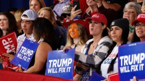 Donald Trump supporters frowning at a rally in North Carolina