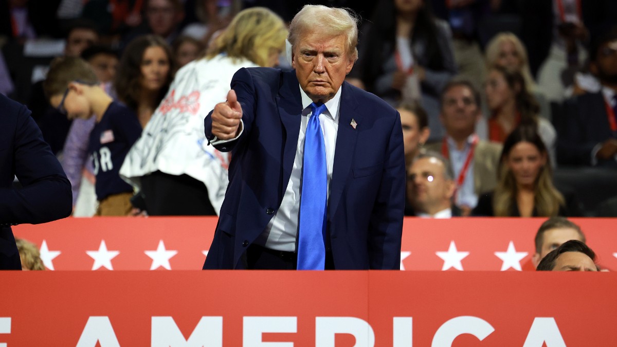 Donald Trump gives a thumbs up at the 2024 RNC