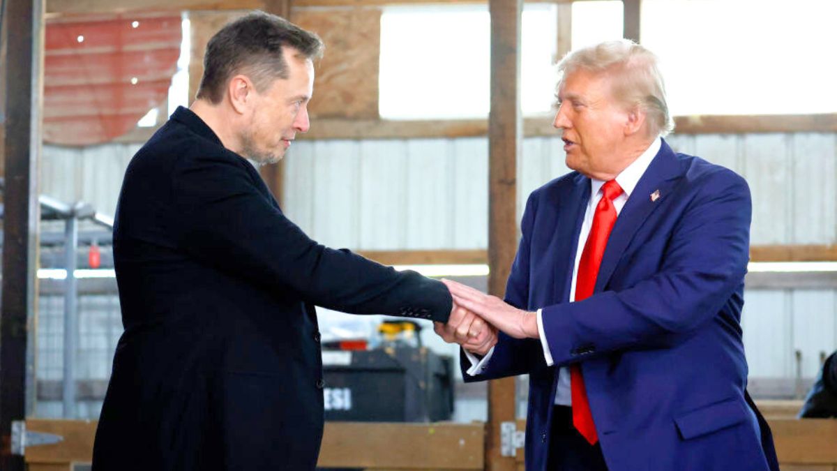 BUTLER, PENNSYLVANIA - OCTOBER 05: Elon Musk (L) shakes hands with Republican presidential nominee, former President Donald Trump back stage during a campaign rally at the Butler Farm Show grounds on October 05, 2024 in Butler, Pennsylvania. This is the first time that Trump has returned to Butler since he was injured during an attempted assassination on July 13. (Photo by Anna Moneymaker/Getty Images)