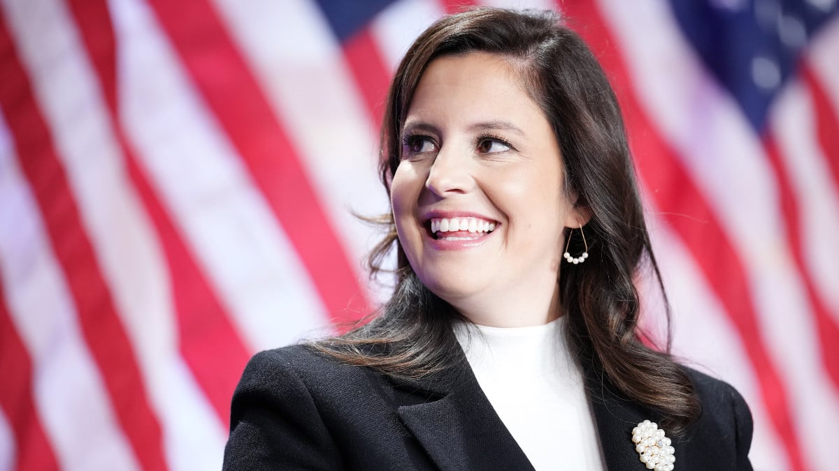 WASHINGTON, DC - NOVEMBER 13: House Republican Conference Chair Rep. Elise Stefanik (R-NY) listens as U.S. President-elect Donald Trump speaks at the House Republicans Conference meeting at the Hyatt Regency on Capitol Hill on November 13, 2024 in Washington, DC. As is tradition with incoming presidents, Trump is traveling to Washington, DC to meet with U.S. President Joe Biden at the White House as well as meet with Republican congressmen on Capitol Hill. (Photo by Andrew Harnik/Getty Images)