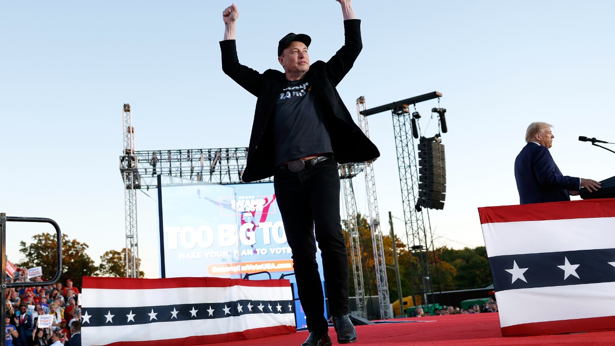 Elon Musk leaves the stage after speaking at a Trump rally in Butler, PA