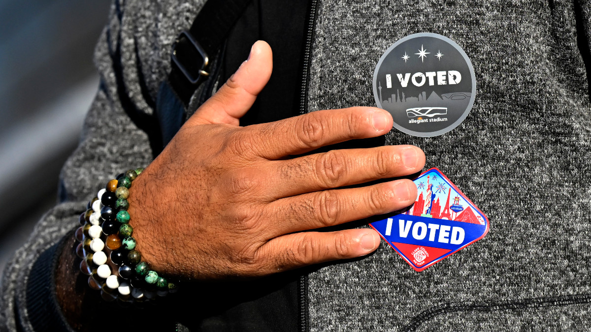 LAS VEGAS, NEVADA - NOVEMBER 05: A voter displays Las Vegas-themed "I Voted" stickers after casting his ballot at Allegiant Stadium on November 05, 2024 in Las Vegas, Nevada. Americans cast their ballots today in the presidential race between Republican nominee former President Donald Trump and Democratic nominee Vice President Kamala Harris, as well as multiple state elections that will determine the balance of power in Congress. (Photo by David Becker/Getty Images)