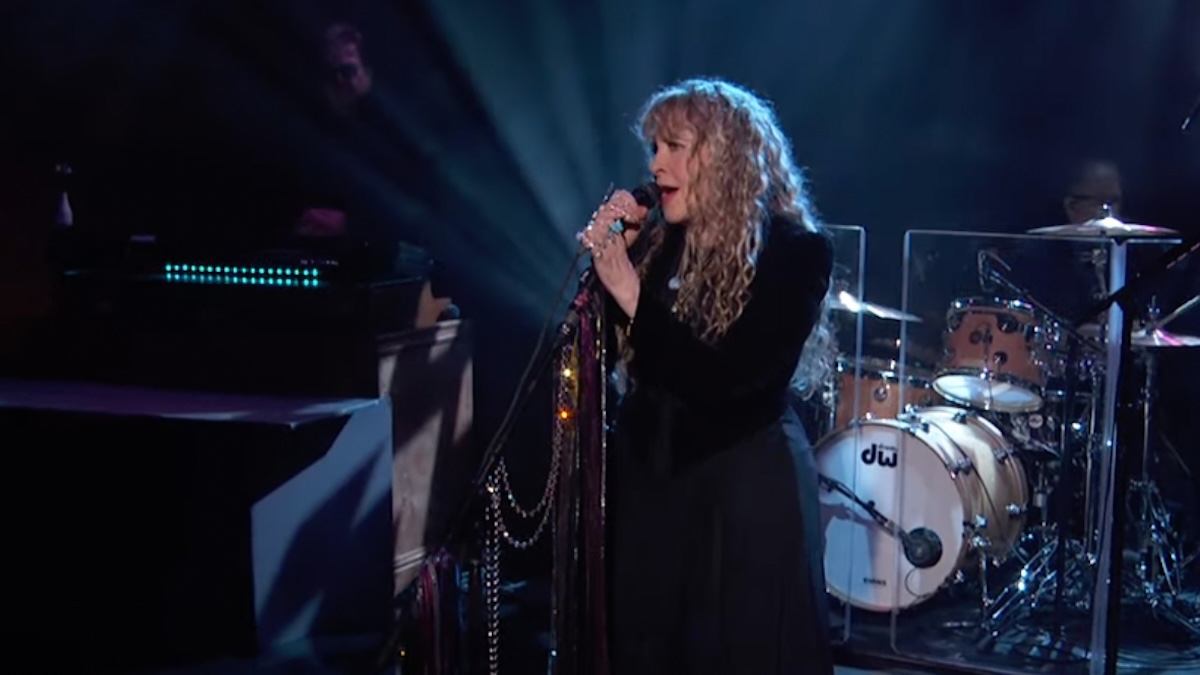 stevie nicks singing with lights behind her