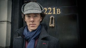 Benedict Cumberbatch as Sherlock Holmes in 'Sherlock' standing outside the 221B Baker Street door