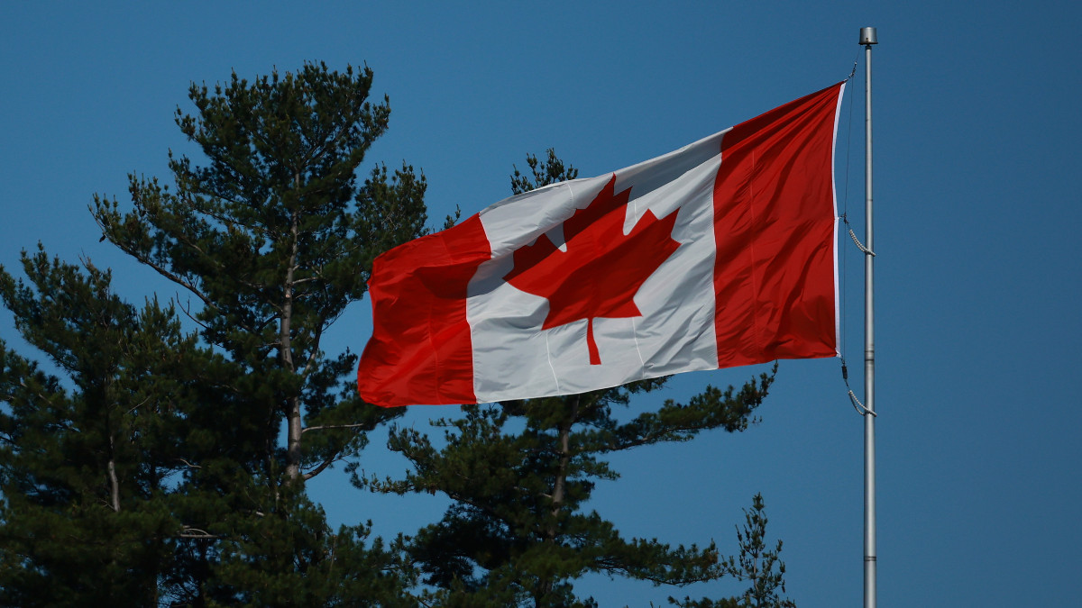 HAMILTON, ONTARIO - MAY 30: The Canadian flag blows in the breeze during the first round of the RBC Canadian Open at Hamilton Golf & Country Club on May 30, 2024 in Hamilton, Ontario. (Photo by Vaughn Ridley/Getty Images)