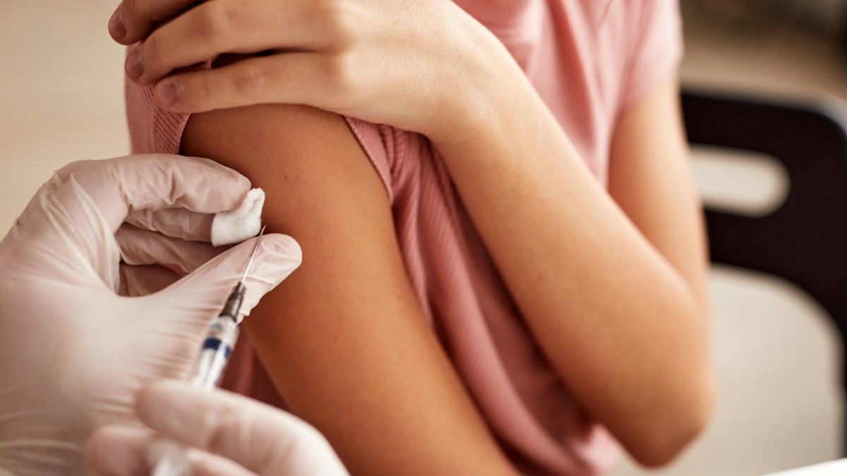 Close-up of a child receiving a vaccine