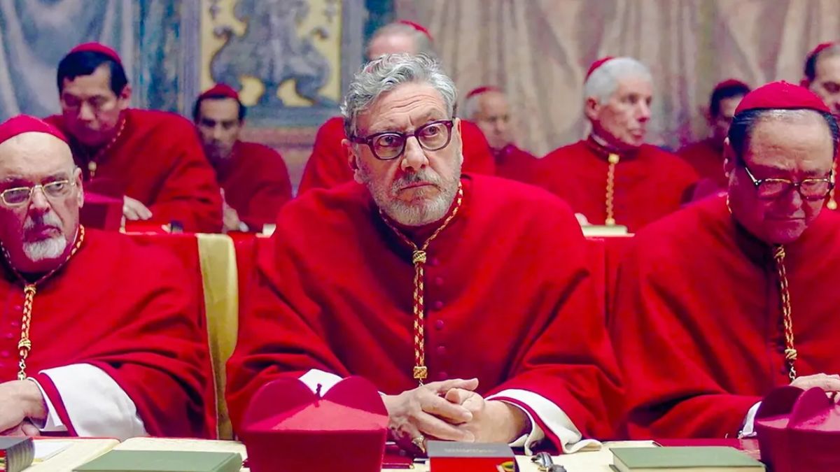 Rows of cardinals sitting in conclave at the Vatican