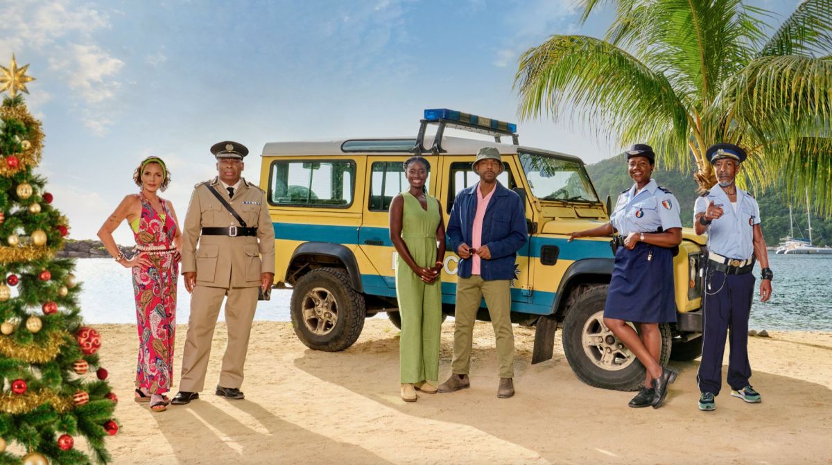 The cast of 'Death in Paradise' season 14 with new DCI Mervin Wilson (Don Gilet). 