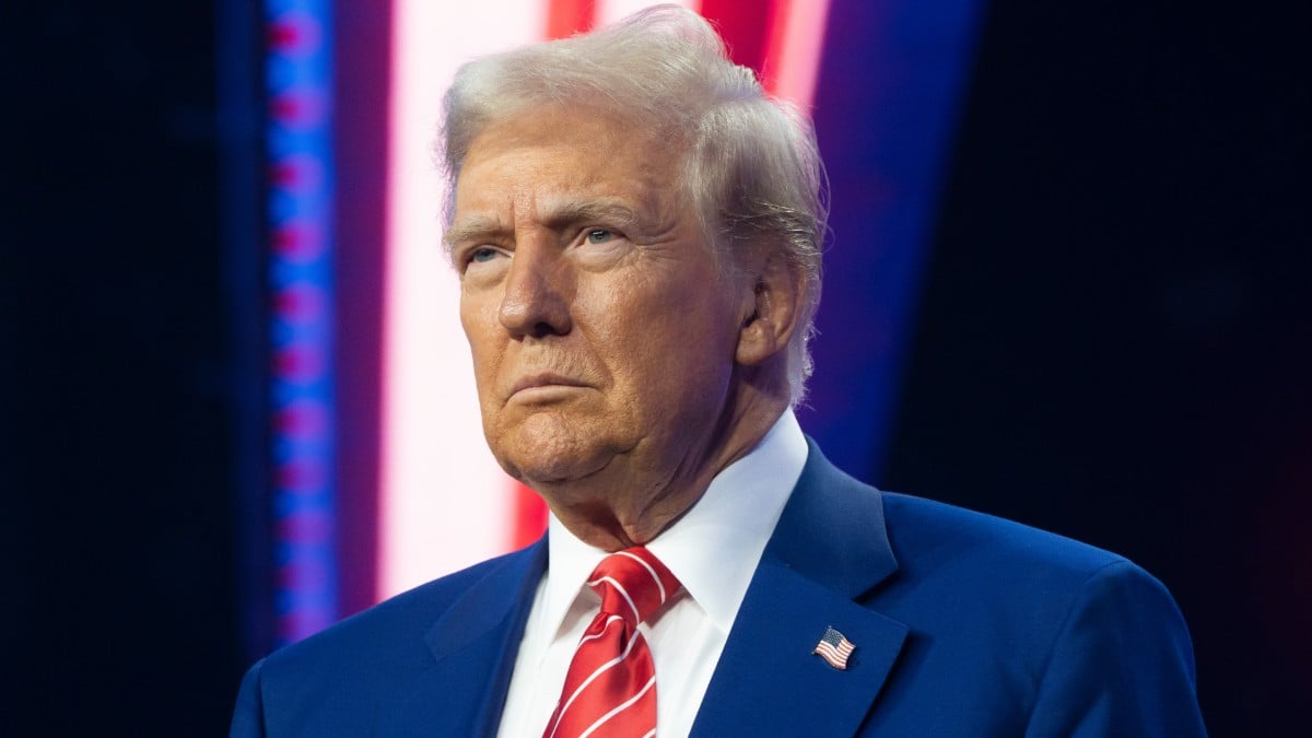 Donald Trump looks on at a Turning Point conference in Arizona