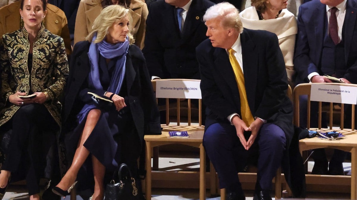 Jill Biden and Donald Trump talk to each other at the reopening of Notre-Dame of Paris Cathedral