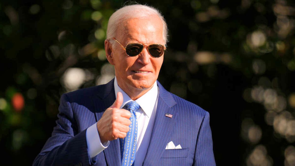 WASHINGTON, DC - NOVEMBER 25: U.S. President Joe Biden motions to the audience after pardoning the National Thanksgiving Turkey Peach during a ceremony on the South Lawn of the White House on November 25, 2024 in Washington, DC. Peach, and the alternate turkey Blossom, were raised in Northfield, Minnesota, and continue a White House tradition going back to the Truman administration in 1947. (Photo by Andrew Harnik/Getty Images)