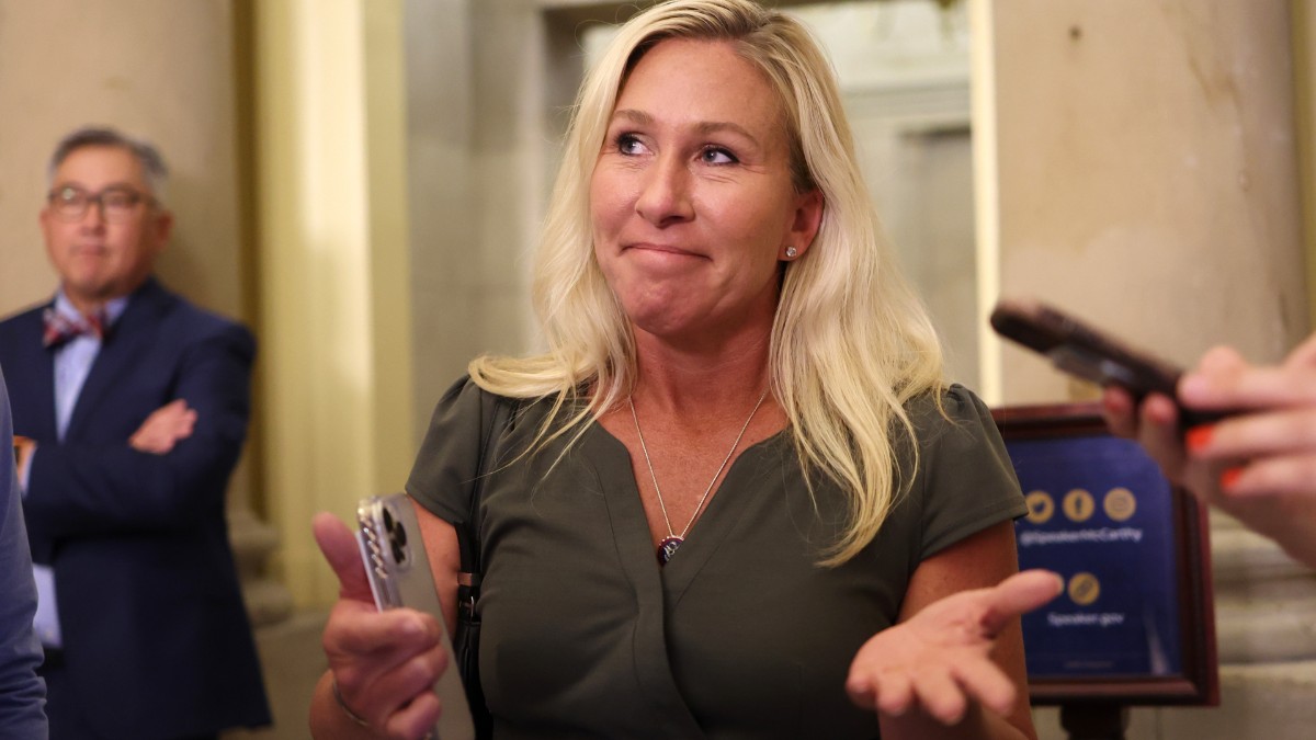 Marjorie Taylor Greene talks to reporters at the U.S. Capitol